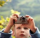 kid taking photo